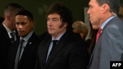 Argentine President Javier Milei leaves a ceremony to commemorate the 32nd anniversary of the bombing at the Israeli embassy in Buenos Aires that killed 29 people and wounded 200, at the Israeli Embassy Square in Buenos Aires on March 18, 2024.