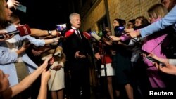 Lithuanian President Gitanas Nauseda speaks to the media as he celebrates his victory in the final round of presidential elections in Vilnius, Lithuania, May 26, 2024. 