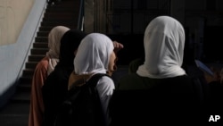 FILE - Students speak during an interview at Ibn Khaldoun, a private Muslim school, in Marseille, southern France, April 18, 2024. 