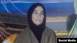 Urmiyədə asılan Pərvin Musəvi (Şəkil IHR təşkiıatının Telegram kanalından götürülüb.)