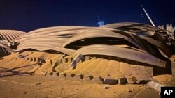 สำนักงานประชาสัมพันธ์เขตปกครองโอเดสซา ยูเครน เผยแพร่ภาพความเสียหายของโกดังเก็บธัญพืชที่ท่าเรือแม่น้ำดานูบใกล้เมืองโอเดสซา หลังการโจมตีด้วยโดรนของรัสเซียเมื่อวันที่ 16 สิงหาคม (ภาพจาก Odesa Regional Administration Press Office และ AP)