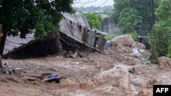 Mfano wa mvua kubwa zilizosababisha vifo na uharibifu wa mali nchini DRC huku baadhi ya watu wakisheherekea sikukuu ya Krismas