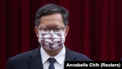 FILE - Taoyuan Mayor Cheng Wen-tsan attends a ceremony for the donation of medical supplies to India to fight the coronavirus disease (COVID-19) outbreak, in Taipei, Taiwan May 5, 2021.