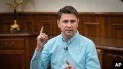 Ukrainian Presidential adviser Mykhailo Podolyak speaks during an interview with The Associated Press in Kyiv, Ukraine, July 25, 2024.