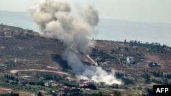 ควันพวยพุ่งขึ้นระหว่างการโจมตีหมู่บ้านแห่งหนึ่งทางใต้ของเลบานอน วันที่ 26 มิ.ย. 2024