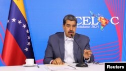 Venezuela's President Nicolas Maduro attends a virtual meeting of the Community of Latin American and Caribbean States (CELAC), in Caracas, Venezuela, April 16, 2024. (Miraflores Palace/Handout via Reuters)