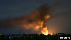 ផ្សែង​ហុយ​ឡើង​អំឡុង​ការវាយប្រហារ​តាម​ដ្រូន​ពី​រុស្ស៊ី​លើ​ទីក្រុងKherson​ ប្រទេស​អ៊ុយក្រែនកាលពីថ្ងៃទី​២៦ កក្កដា​ ឆ្នាំ២០២៤។