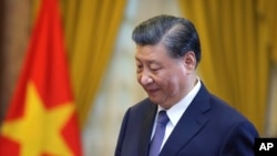 中国国家主席习近平在河内进行访越之行。(2023年12月13日)