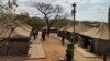 A camp where 95 Libyan nationals were arrested on suspicion of running an illegal military camp are seen lining up after their arrest on Friday July 26, 2024 in White River, South Africa.