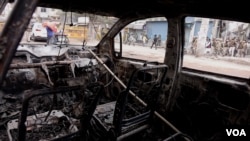 FILE - Paramilitary police patrol a Muslim-majority area of Delhi, March 1, 2020, days after Hindu rioters set fire to Muslim properties during the communal violence that broke out following weekslong anti-CAA protests. (Shaikh Azizur Rahman for VOA)