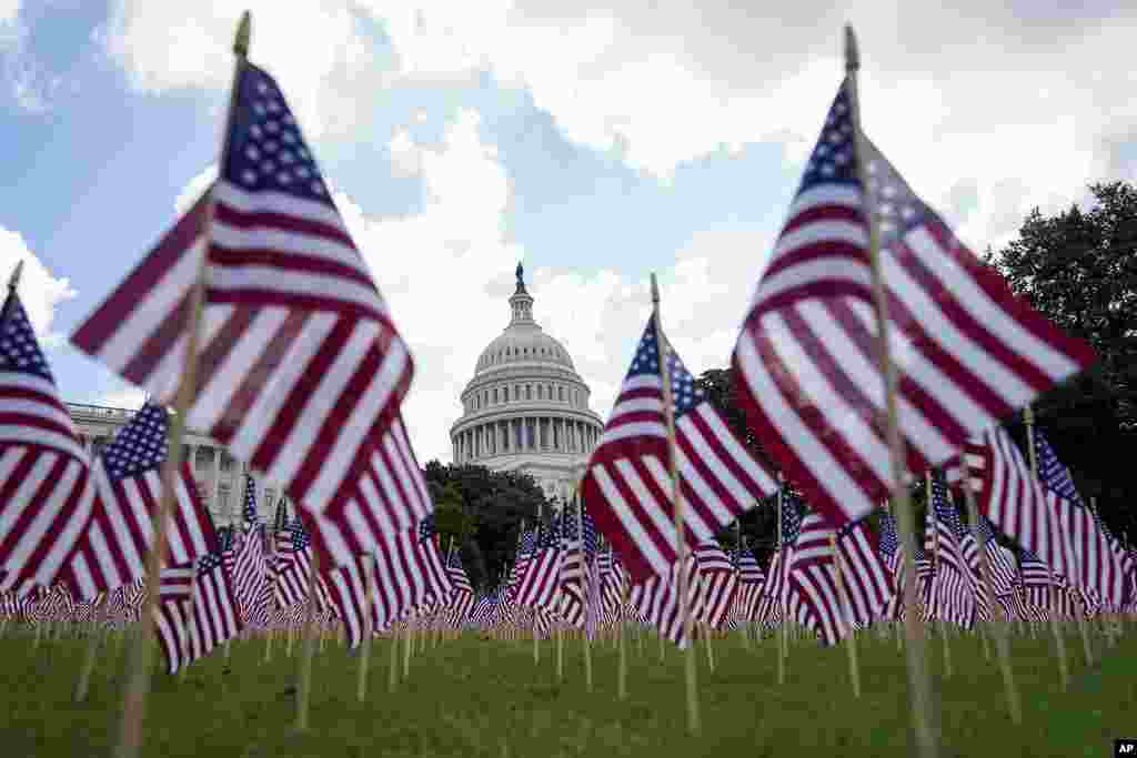American flags are placed outside the U.S. Capitol in Washington, on the 22nd anniversary of the Sept. 11, 2001, terror attack.