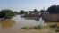 FILE - Homes are submerged in water after a massive flooding in N'djamena, Chad, October 14, 2022. Some 245,000 civilians are currently affected by floods in 13 of Chad's 23 provinces, according to officials.