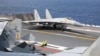 FILE - In this photo released by Xinhua News Agency, a J-15 Chinese fighter jet prepares to take off from an aircraft carrier during military exercises around the Taiwan Island by the Chinese People's Liberation Army, April 9, 2023. 