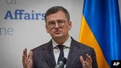 FILE - Ukraine's Foreign Minister Dmytro Kuleba attends a news conference in Kyiv, Ukraine, March 13, 2024.