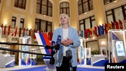 FILE — Yekaterina Duntsova speaks in Moscow, Russia, Dec. 20, 2023. On Saturday, the former TV journalist was disqualified as a candidate for Russia's presidential election. She planned to run on a platform of opposing the war in Ukraine.