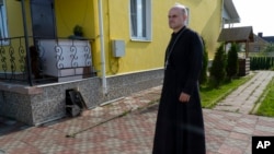 The Rev. Ioann Burdin wanted to leave the Russian Orthodox Church after speaking out against Russia's invasion of Ukraine. The court fined him for discrediting the Russian army and his church leader banned him from service until he publicly apologized.