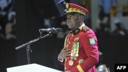 FILE - Gabon Transitional President General Brice Oligui Nguema speaks during the opening of the National Dialogue in Gabon at the Libreville Gymnasium in Libreville on April 2, 2024. The month-long talks conclude at the end of April 2024.
