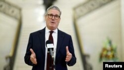 British Prime Minister Keir Starmer speaks to media at the Stormont Parliament Buildings, in Belfast, Northern Ireland, July 8, 2024. 