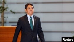 FILE - Philippine National Security Adviser Eduardo Ano arrives to meet Japanese Prime Minister Fumio Kishida at the prime minister's office in Tokyo, Japan, June 15, 2023. 