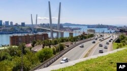 FILE - A view of the bridge connecting the Russky Island and Vladivostok, in Russia's far east, is seen on Aug. 26, 2023. An American soldier reportedly has been detained in Vladivostok last Thursday on charges of criminal misconduct. 