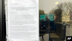 A sign posted on a Silicon Valley Bank in Santa Clara, California, March 10, 2023.