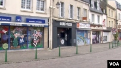 Reminders of D-Day are everywhere in Carentan-les-Marais, France, which endured a six-day battle in 1944 before it was liberated. (Lisa Bryant/VOA)