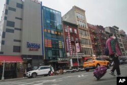 Olti qavatli ko'k bino, deydi tergovchilar, Xitoyning Nyu-Yorkdagi politsiya uchastkasi sifatida ishlatilgan.