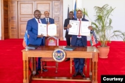 Kenya President William Ruto and Haiti PM Ariel Henry witnessed the signing ceremony at Kenya’s State House in Nairobi, March 1, 2024. (Courtesy, Kenya's State House)