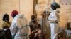 FILE - Health workers treat cholera patients at the Bwaila Hospital in Lilongwe central Malawi on Jan. 11, 2023.