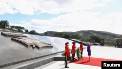 U.S. First Lady Jill Biden takes part in a wreath laying ceremony at the Heroes’ Acre, in the capital Windhoek, in Namibia, Feb. 22, 2023.