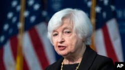 FILE — Treasury Secretary Janet Yellen speaks at Johns Hopkins University School of Advanced International Studies in Washington, April 20, 2023. She said Fitch Ratings' downgrade of the U.S. government's credit rating this week was "based on outdated data." 