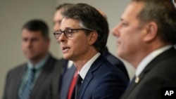 U.S. Attorney Henry C. Leventis, second from right, announces the arrest and indictment of U.S. Army Intelligence Analyst Korbein Schultz for conspiracy to obtain and disclose defense information, March 7, 2024, in Nashville, Tenn.