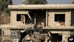 Mfano wa maeneo yaliyoharibiwa huko Ukingo wa Magharibi ikiwemo mji wa Qabatiya, June 13, 2024.