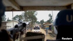 United Nations peacekeepers patrol towards the Kigonze camp for the internally displaced people in Bunia, Ituri province of the Democratic Republic of Congo March 2, 2023.