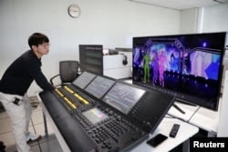 Lee Sang-heon, CEO of Metalocat, who created virtual stage for virtual girl group MAVE, works in Seoul, South Korea, February 28, 2023. REUTERS/Kim Soo-hyeon