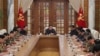 This undated photo released by North Korea's official Korean Central News Agency on March 12, 2023, shows North Korean leader Kim Jong Un at a meeting of the 8th Central Military Commission of the Workers' Party of Korea in Pyongyang.