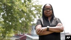 Philadelphia school district teacher Rhonda Hicks poses for a portrait at her home in Philadelphia, Thursday, July 20, 2023. 
