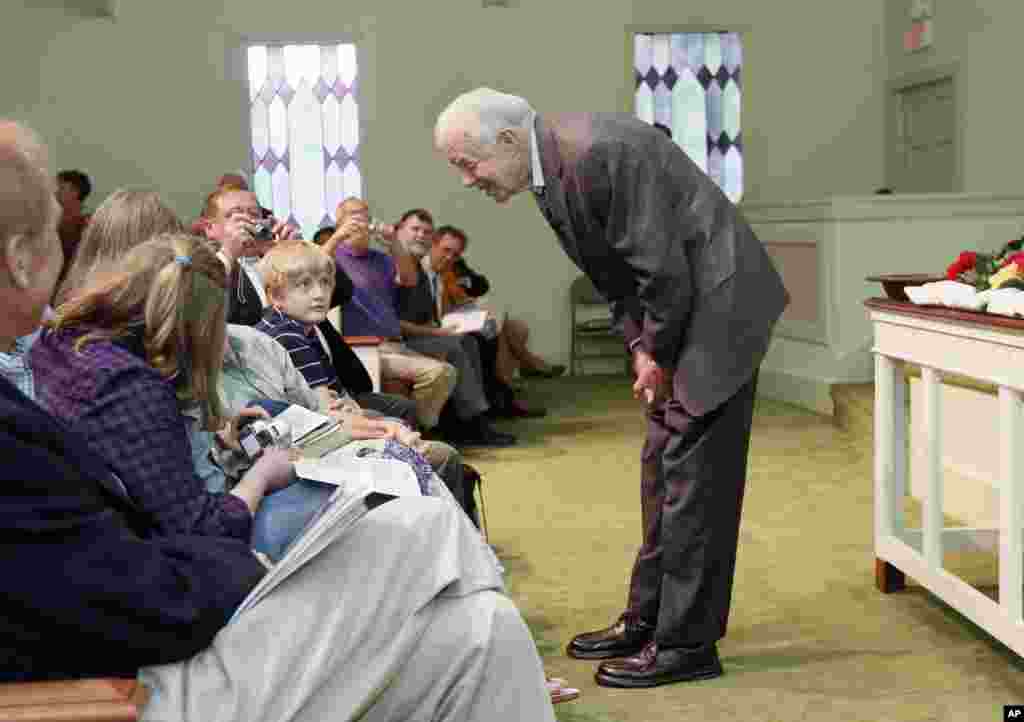 Former President Jimmy Carter teaches Sunday school at Maranatha Baptist Church in Plains, Georgia, Sept. 22, 2009.