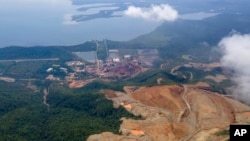 FILE - An aerial view of the Fenix Mine, run by the Swiss-based Solway Investment Group, in El Estor, Guatemala, Oct. 26, 2021.