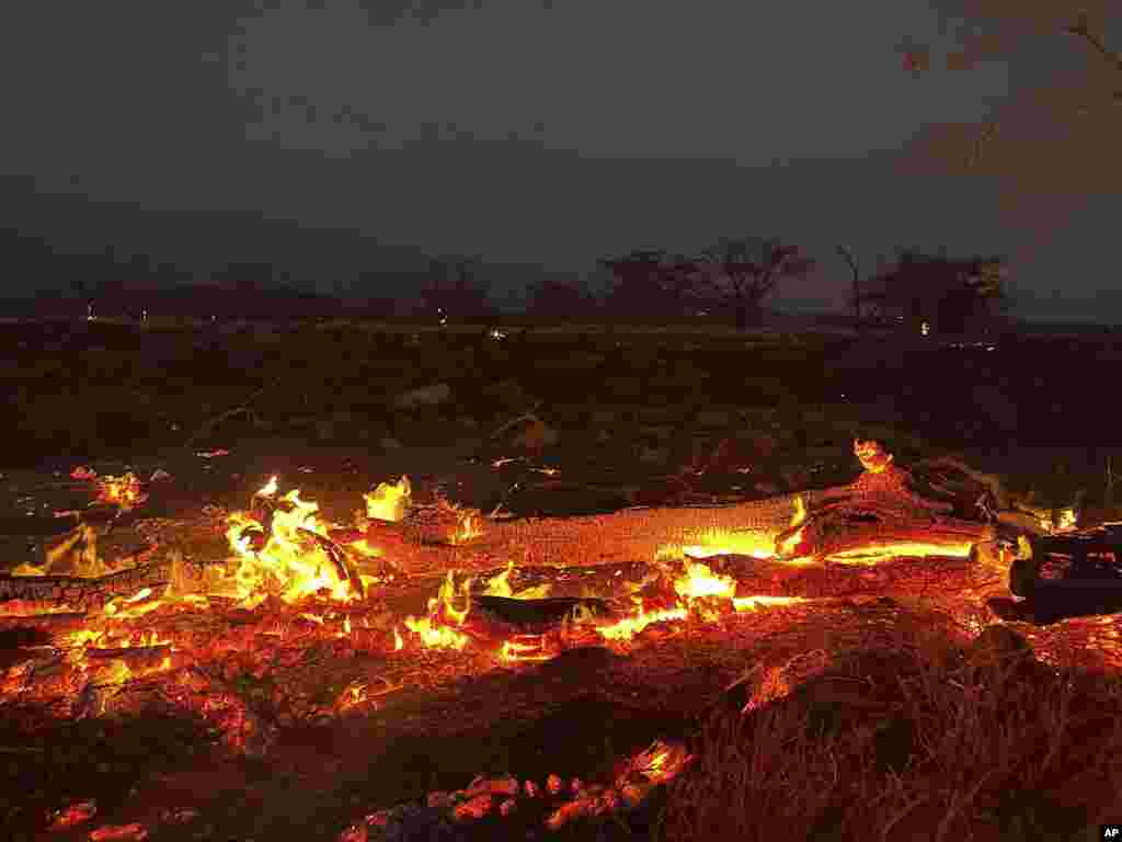 A wildfire burns in Kihei, Hawaii, Aug. 9, 2023.&nbsp;Thousands of residents raced to escape homes on Maui as blazes swept across the island, destroying parts of a centuries-old town in one of the deadliest U.S. wildfires in recent years.&nbsp;