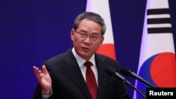 Chinese Premier Li Qiang speaks during a joint press conference in Seoul, South Korea, May 27, 2024. Li will arrive in Australia on June 15, the first visit by a Chinese premier since 2017, in a sign of improving ties, Australian Prime Minister Anthony Albanese said.