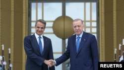 Turkey's President Tayyip Erdogan meets with Greek Prime Minister Kyriakos Mitsotakis at the Presidential Palace in Ankara, Turkey, May 13, 2024.
