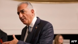 FILE - Reza Pahlavi, Iran's exiled crown prince and oldest son of the last Shah of Iran, attends a panel discussion at the Munich Security Conference in Munich, Germany, Feb. 18, 2023.