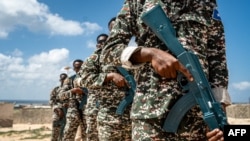 Des soldats participent à un entraînement de l'armée somalienne à Mogadiscio le 19 mars 2024. AFP / Amaury Falt-Brown