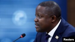 FILE - Zambian Foreign Minister Stanley Kakubo participates in a memorandum of understanding signing ceremony with U.S. Secretary Antony Blinken and Democratic Republic of the Congo Foreign Minister Christophe Lutundula, in Washington, Dec. 13, 2022. 
