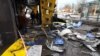Wreckage lies on the ground at a bus station damaged after Russian shelling in Kherson, Ukraine, Feb. 21, 2023.