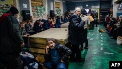 Ukrainians gather at a humanitarian aid center in Bakhmut, Ukraine, on Feb. 27, 2023 .