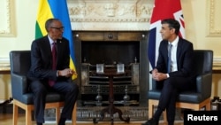 FILE - British Prime Minister Rishi Sunak, right, and visiting Rwandan President Paul Kagame meet at 10 Downing Street, London, May 4, 2023. 