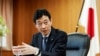 FILE - Nishimura Yasutoshi, Minister of Economy, Trade and Industry (METI), talks during an interview with Reuters in Tokyo, Japan, April 5, 2023. 
