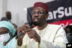 FILE - Senegalese opposition leader Ousmane Sonko in Dakar, Senegal, on March 8, 2021. Journalists Pape Alé Niang and Abdou Khadre Sakho ran afoul of the Senegal government by reporting about Sonko.